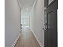 Inviting entryway displaying sleek, modern flooring leading to a bright living area at 693 Sunstone Ln, Lawrenceville, GA 30043