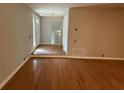 Inviting living room featuring pristine hardwood floors, neutral walls, and natural light at 40 Dunwoody Springs Dr, Atlanta, GA 30328