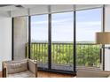 Stunning outdoor view from the living room's expansive window at 145 15Th Ne St # 1209, Atlanta, GA 30309
