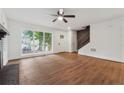 Bright living room featuring refinished floors, modern lighting, and an inviting atmosphere at 2780 Northwood Court Sw Ct, Marietta, GA 30060