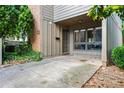 The entrance with a driveway offers a convenient parking space and easy access to the home's front door at 2471 Cedar W Brk, Marietta, GA 30067