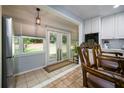 Bright eat-in kitchen area leading to a sunny screened porch at 2639 Hummingbird Nw Dr, Duluth, GA 30096