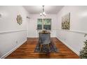 Bright dining room features hardwood floors, modern lighting and elegant decor at 425 Lindbergh Ne Dr # A2, Atlanta, GA 30305