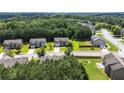 An aerial view of homes shows the surrounding neighborhood and community at 1492 Station Ridge Ct, Lawrenceville, GA 30045