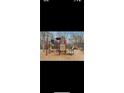 Community playground with climbing structures, slides, and benches for recreation at 710 Larkspur Nw Blvd, Acworth, GA 30102