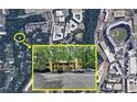 Aerial view showcasing property location near Truist Park, surrounded by trees and green space at 1010 Donegal Se, Smyrna, GA 30080