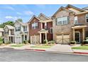 Attractive townhomes with neat landscaping and convenient parking spaces at 1384 Dolcetto Nw Trce, Kennesaw, GA 30152