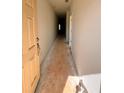 Hallway with door showcasing new construction ready for customization and design at 7216 Eton Ln, Locust Grove, GA 30248