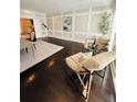 Inviting living area featuring stylish seating, modern decor, and hardwood floors at 3201 Palisades Se Ct, Marietta, GA 30067