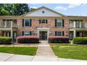 Charming brick condo building with manicured lawns and private balconies at 3650 Ashford Dunwoody Ne Rd # 413, Atlanta, GA 30319