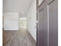 Inviting entryway with wood-look flooring leading into the bright and spacious interior at 358 Orwell Dr, Social Circle, GA 30025