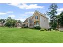Lovely home with a manicured lawn, providing ample space and curb appeal at 479 Rising Sun Path, Lawrenceville, GA 30043