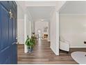 Inviting foyer with hardwood floors, offering a glimpse into the spacious living areas at 479 Rising Sun Path, Lawrenceville, GA 30043
