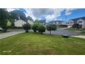 Residential street showcases well-manicured lawns and mature trees in a peaceful neighborhood at 3219 Roundfield Cir, Duluth, GA 30096