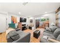 Bright living room boasts hardwood floors, ample seating, and an open layout at 2110 Augusta Se Dr # 204, Marietta, GA 30067