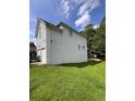 This is a view of the side of the house with a two car garage at 199 Scenic View Ln, Stone Mountain, GA 30087