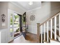 Inviting foyer features hardwood floors, decorative molding, and an open view to the front yard at 1270 Briarwood Ne Rd, Atlanta, GA 30319