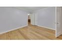 Spacious bedroom featuring hardwood floors, neutral walls and a closet with sliding doors at 849 N Park Ave, Marietta, GA 30060