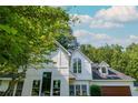Attractive home showcasing architectural details and abundant natural light at 5271 Oglethorpe Ct, Powder Springs, GA 30127