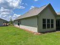 Exterior of home with green lawn at 354 Brooke View Trail, Canton, GA 30115