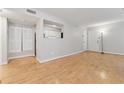 Spacious living area with hardwood floors and kitchen view at 1504 Wingate Way, Atlanta, GA 30350