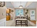 Eat-in dining area adjacent to the kitchen, offering a view of the backyard through a large window at 191 Baywood Way, Hiram, GA 30141