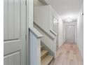 Light and bright entryway featuring wood floors and a staircase to the upper level at 2714 Haynescrest Dr, Grayson, GA 30017
