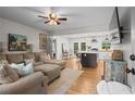 Spacious open-concept living room and kitchen with hardwood floors and stylish decor at 2703 Carolyn Se Dr, Smyrna, GA 30080