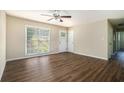Inviting living room with beautiful dark hardwood floors and neutral walls at 1380 Colony Hill Ct, Stone Mountain, GA 30083