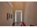 Bright foyer with hardwood floors, high ceilings, and a welcoming front door at 1622 Rivergreen Se Bnd # 26, Atlanta, GA 30339