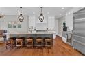 Spacious kitchen with large island, modern stainless appliances, and ample counter space at 1313 Fallsbrook Nw Ter, Acworth, GA 30101