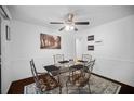 Dining room with unique glass table and modern rug at 3464 Navaho Se Trl, Smyrna, GA 30080