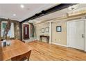 Open dining room with hardwood floors, exposed brick accents, and ample natural light at 685 Argonne Ne Ave # 15, Atlanta, GA 30308