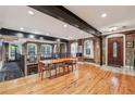 Inviting living room with exposed brick, spiral staircase, and hardwood floors throughout at 685 Argonne Ne Ave # 15, Atlanta, GA 30308