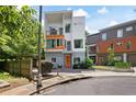 Exterior of the modern residence with a well-manicured yard and visible street access at 1463 Macklone Ne St, Atlanta, GA 30307