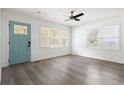 Bright living room featuring new flooring, fresh paint, and abundant natural light at 2879 Harlan Dr, Atlanta, GA 30344