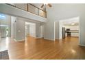 Open-concept living area features hardwood floors and lots of natural light at 2832 Windrush Dr, Buford, GA 30518