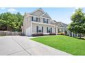 Traditional two-story home with lush front lawn and inviting curb appeal at 405 Blue Sky Circle Cir, Acworth, GA 30102