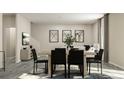 Contemporary dining room with stylish table and chairs set, and modern decor at 516 Almere Dr, Hampton, GA 30228