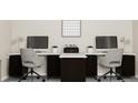 Functional home office setup with dual workstations, ideal for productivity at 516 Almere Dr, Hampton, GA 30228
