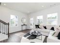 Inviting living room with natural light, comfortable seating, and modern accents at 2682 Brookview Nw Ln, Atlanta, GA 30318