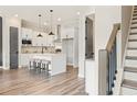 Bright, modern kitchen featuring white cabinets, stainless steel appliances, and a center island with seating at 937 Willingham Dr # 7, Hapeville, GA 30354