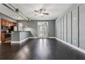 Bright living room features hardwood floors and ample natural light from the door to the outside at 502 Pryor Sw St # 6, Atlanta, GA 30312