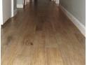Beautiful new hardwood floors adding warmth and elegance to the home's interior at 218 Whispering Pine Circle Ne Cir, White, GA 30184