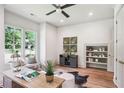 Bright and airy office with hardwood floors, custom built-ins, and large windows at 298 Saint Marys Nw Ln, Marietta, GA 30064