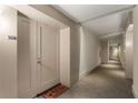 Apartment hallway featuring unit number, and a quirky welcome mat at 3325 Piedmont Ne Rd # 2006, Atlanta, GA 30305