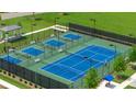 Aerial view of the fenced-in pickleball courts and the charming covered gazebo at 730 Brooke View Drive, Canton, GA 30115