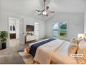 Spacious main bedroom offering a ceiling fan, ensuite bath, and walk-in closet at 5021 Rodrick Trce, Marietta, GA 30066