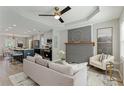 Open floor plan with fireplace, seamlessly connecting the kitchen and living area at 524 Paines Nw Ave, Atlanta, GA 30318