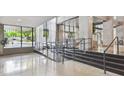 Lobby with handicap ramp and stairs leading to upper levels at 620 Peachtree #901 Ne St, Atlanta, GA 30308